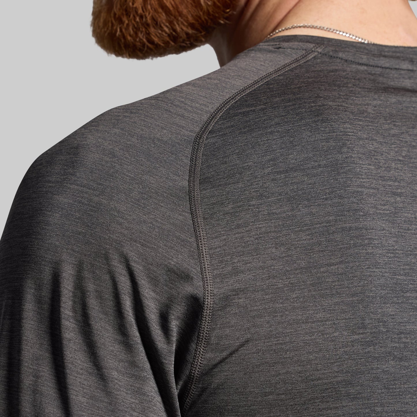 Close-up of a dark gray t-shirt worn by a person