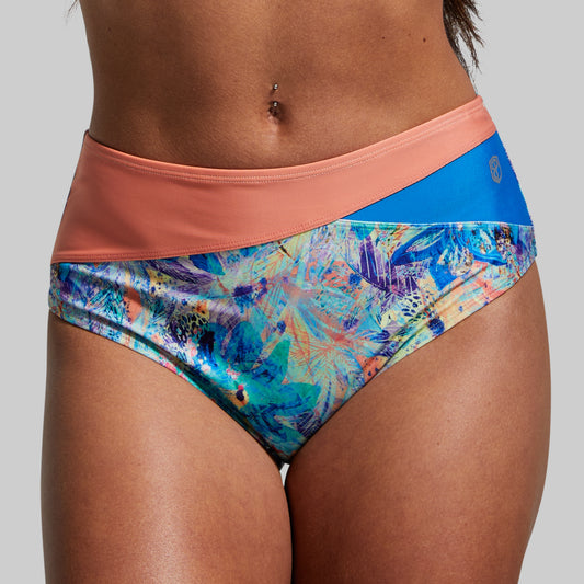 Colorful floral-patterned bikini bottom on a plain background