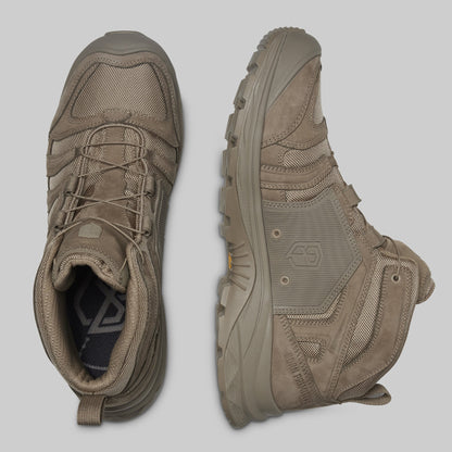 Pair of brown boots on a light gray background