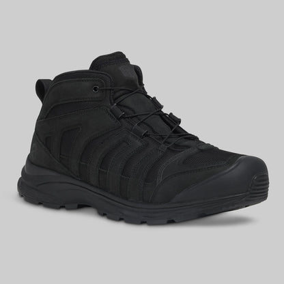 Black tactical boot on a gray background
