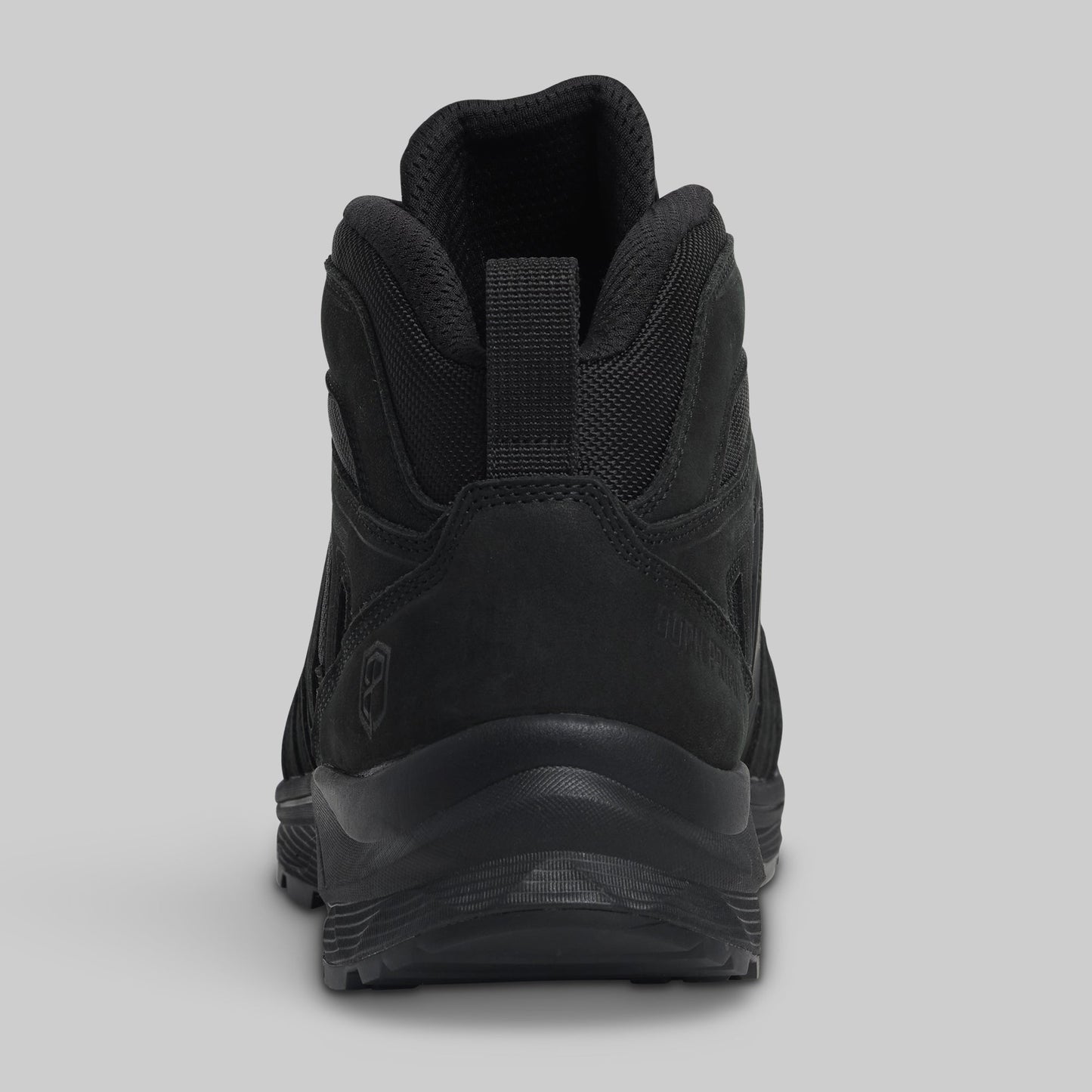 Black boot on a gray background