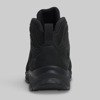 Black boot on a gray background