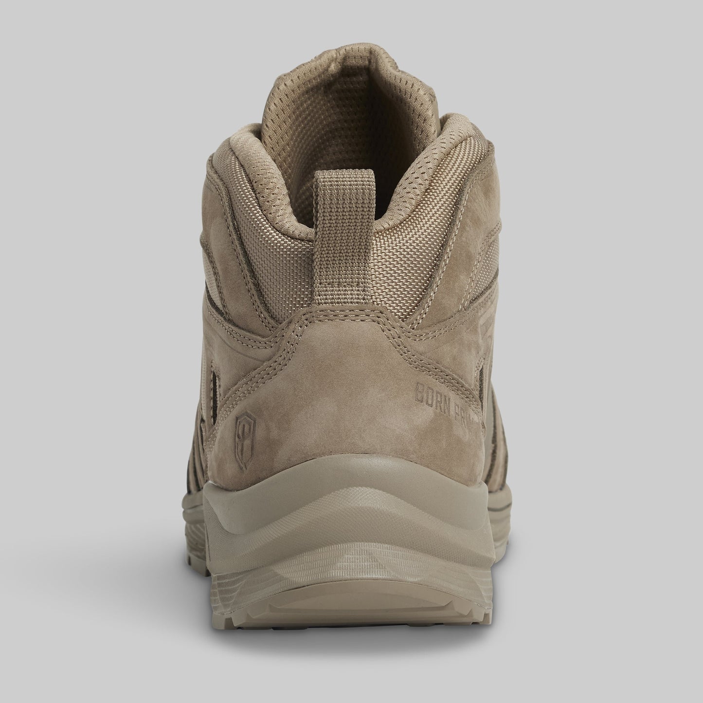 Tan hiking boot on a light gray background