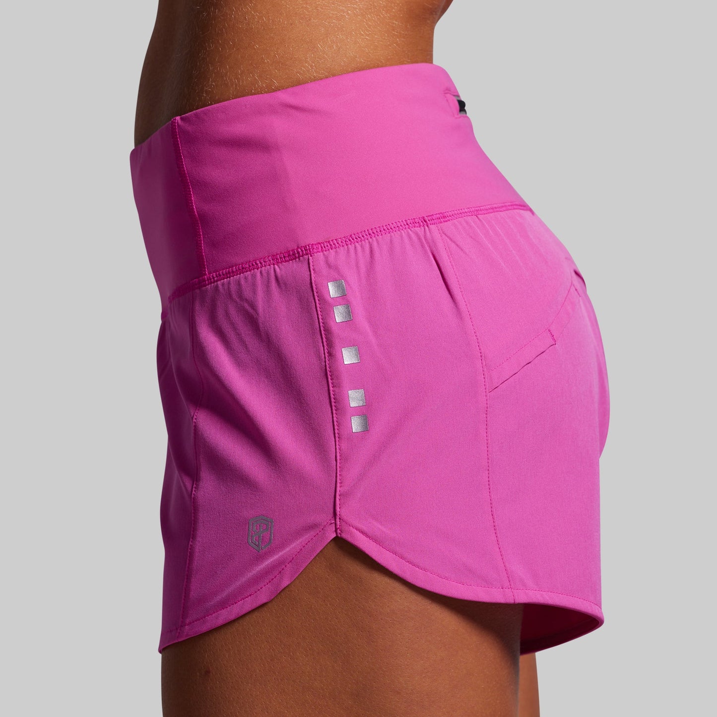 Pink athletic skirt with a gray background