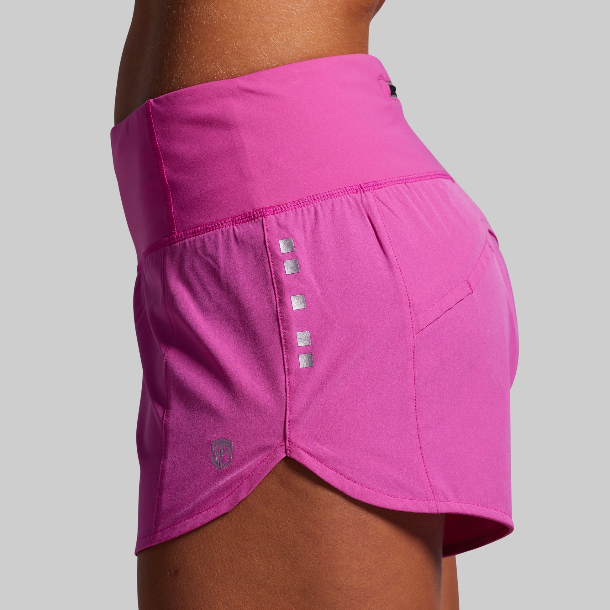 Pink athletic skirt with a gray background