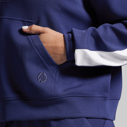 Close up of logo on a blue sweatshirt.
