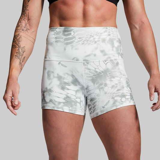 Person wearing light gray patterned shorts on a plain background
