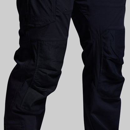 Blue tactical pants on a gray background
