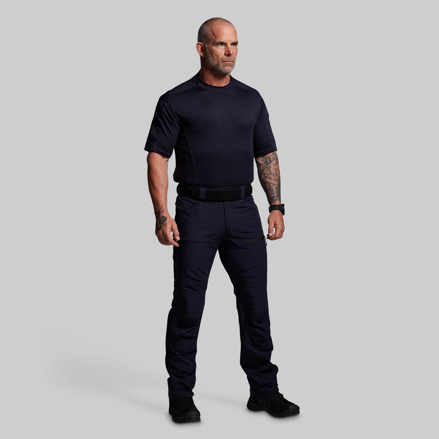 Man wearing a blue pants on a gray background