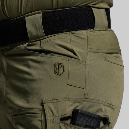 Olive green tactical pants with a logo on a gray background