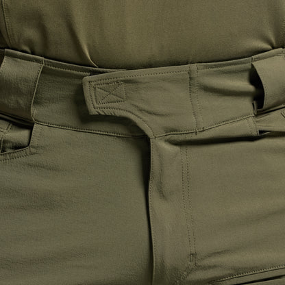Close-up of green tactical pants focusing on the waistband.
