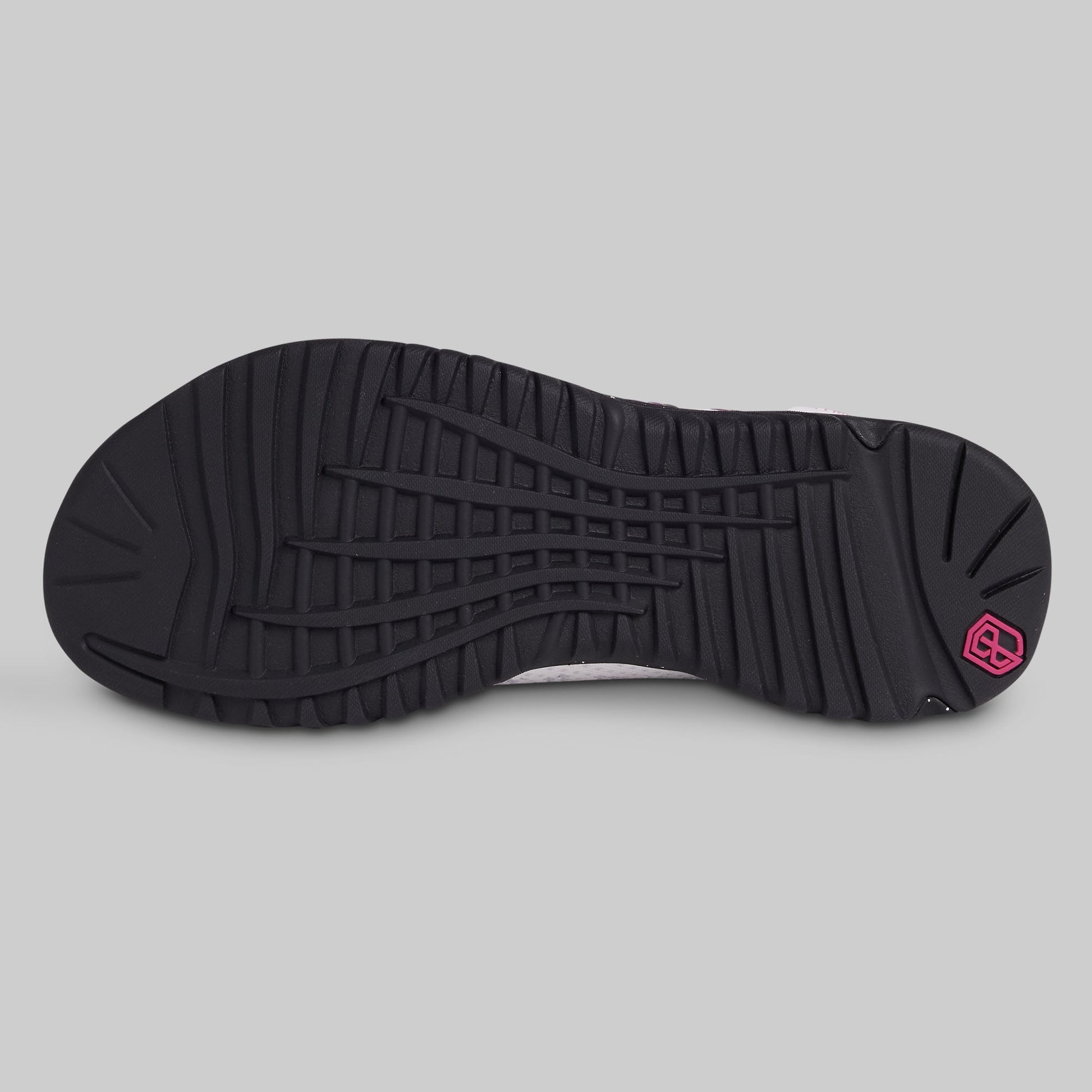 Black sole of a shoe with a brand logo on a gray background