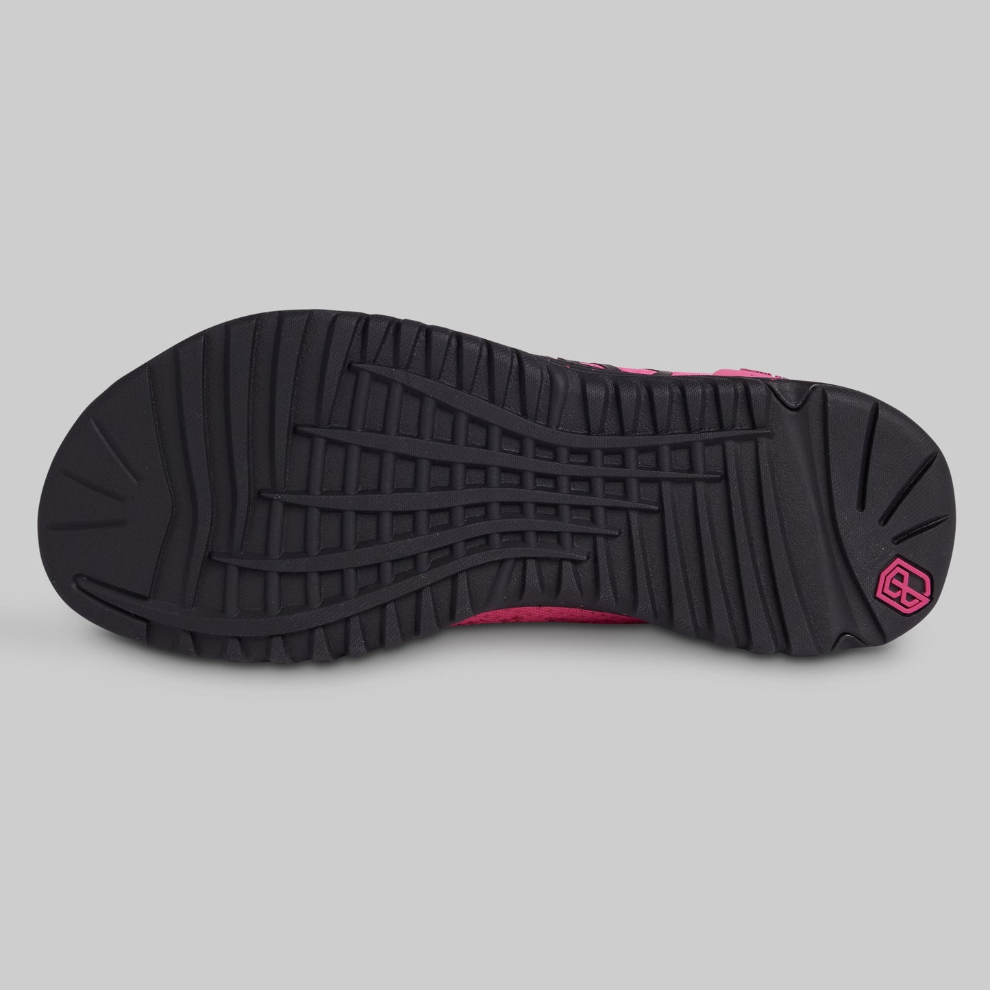 Black sole of a shoe with a brand logo on a gray background