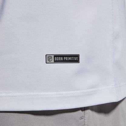 Close-up of brand logo on a white t-shirt.