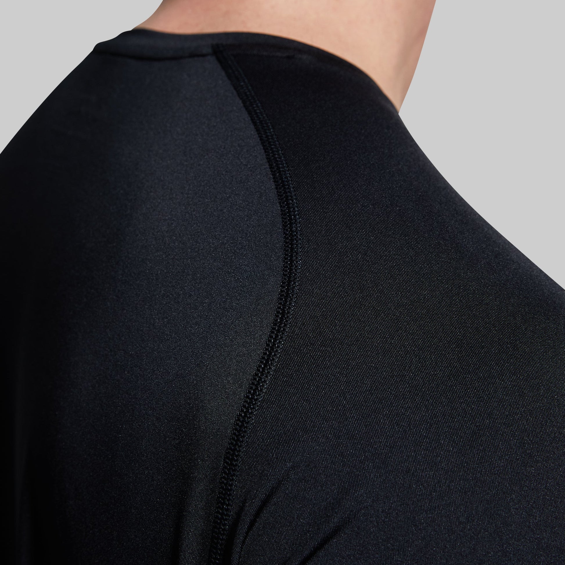 Close-up of black t-shirt worn by a person
