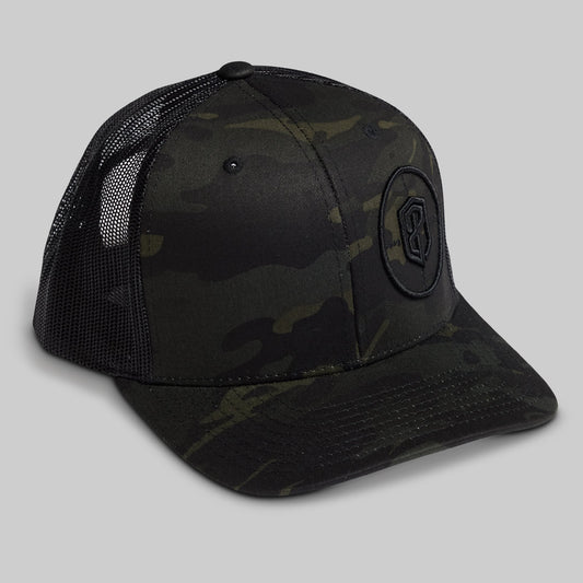 Black camouflage baseball cap with a logo on a gray background
