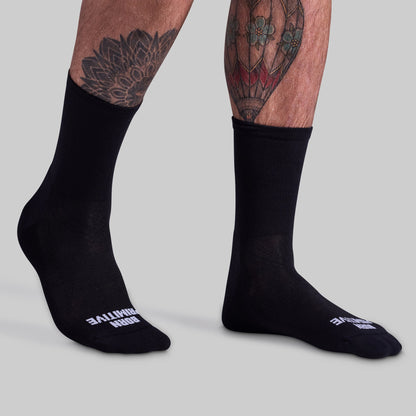 Performance Crew Sock (Black): angled front fit on feet.