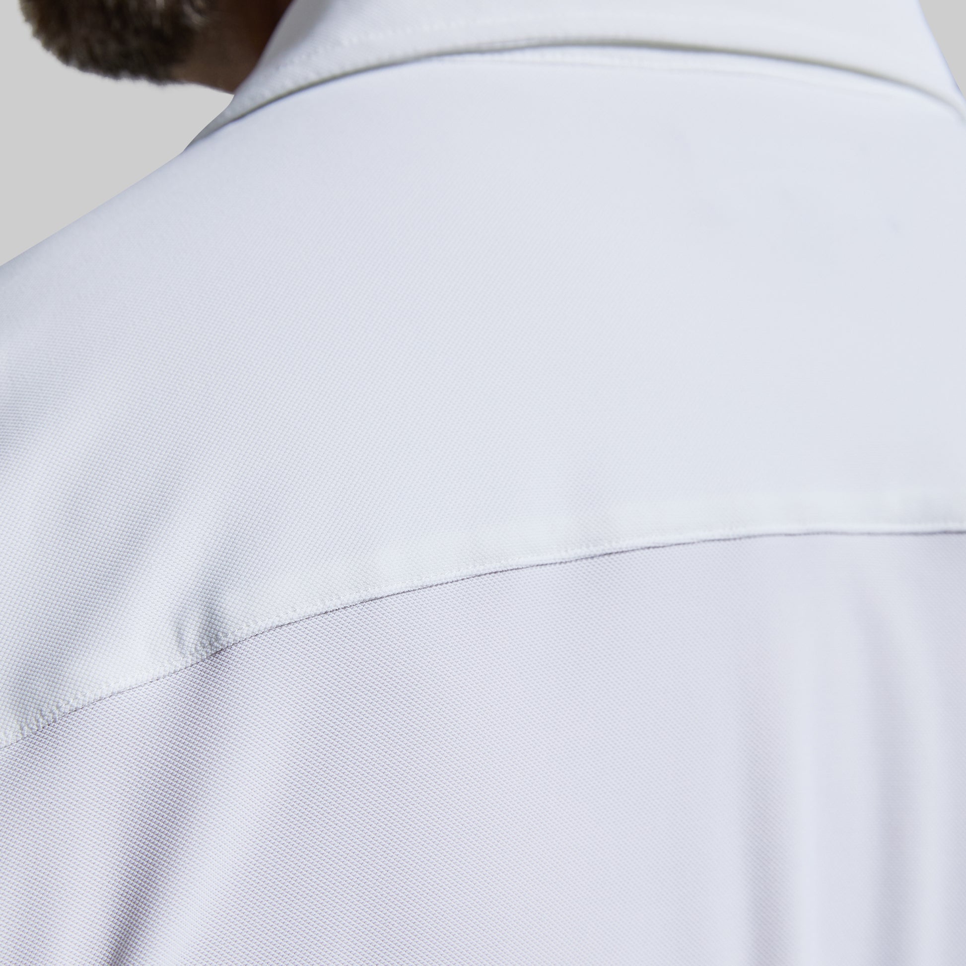 Close-up of a white shirt with a collar