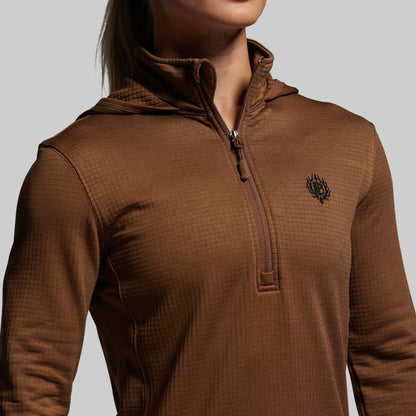 Brown hoodie with a small logo on a gray background