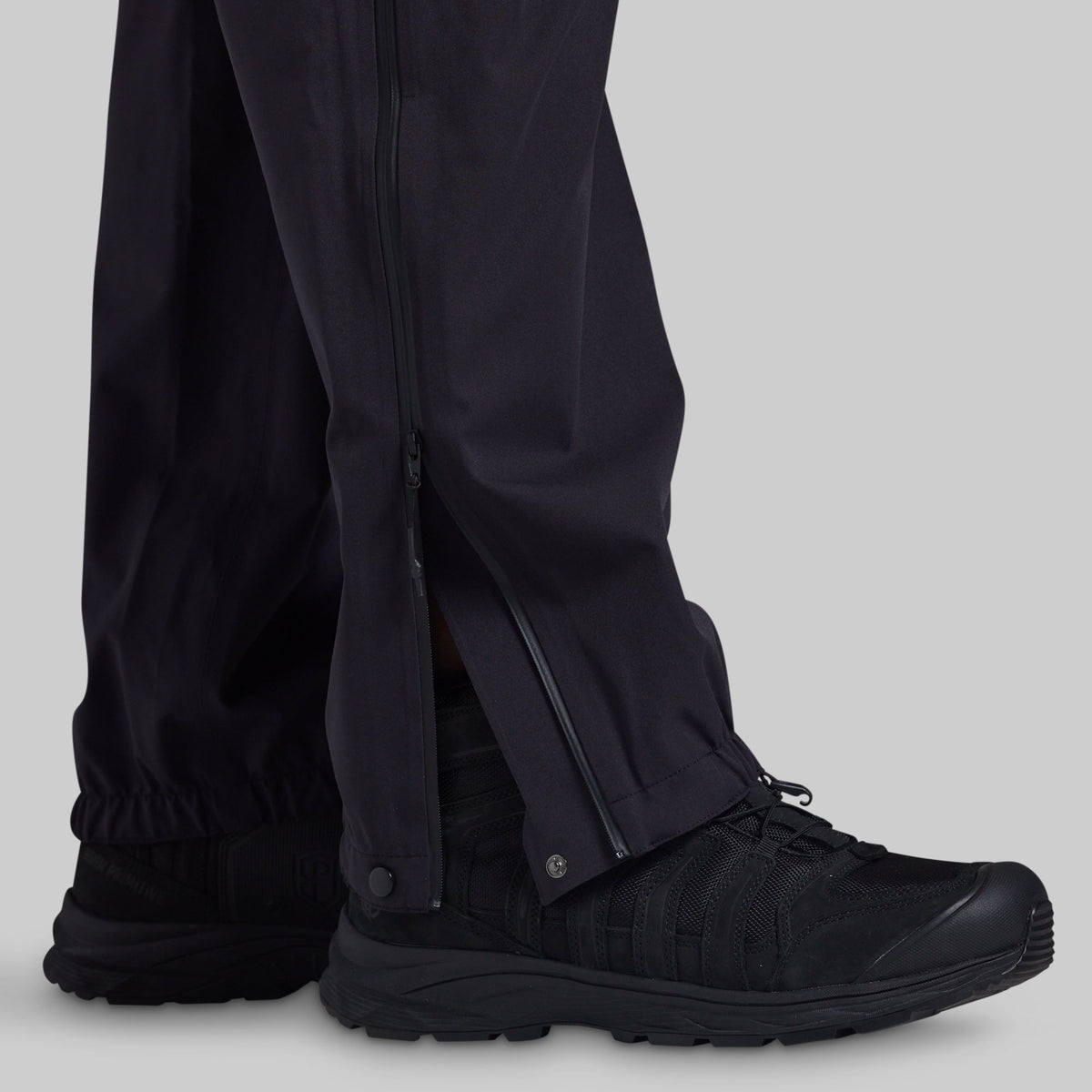 Side zipper and snap cuff on black Mission FLEX Rain Pant 2.0