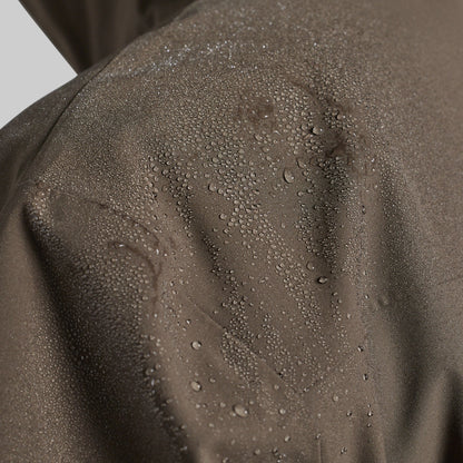 Water beading on the shoulder of the Ranger Green Mission FLEX Rain Jacket 2.0