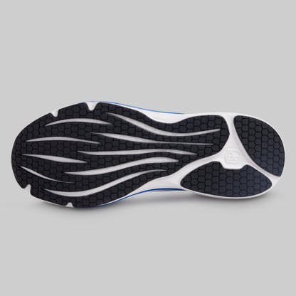 Sole of a running shoe with a brand logo on a gray background