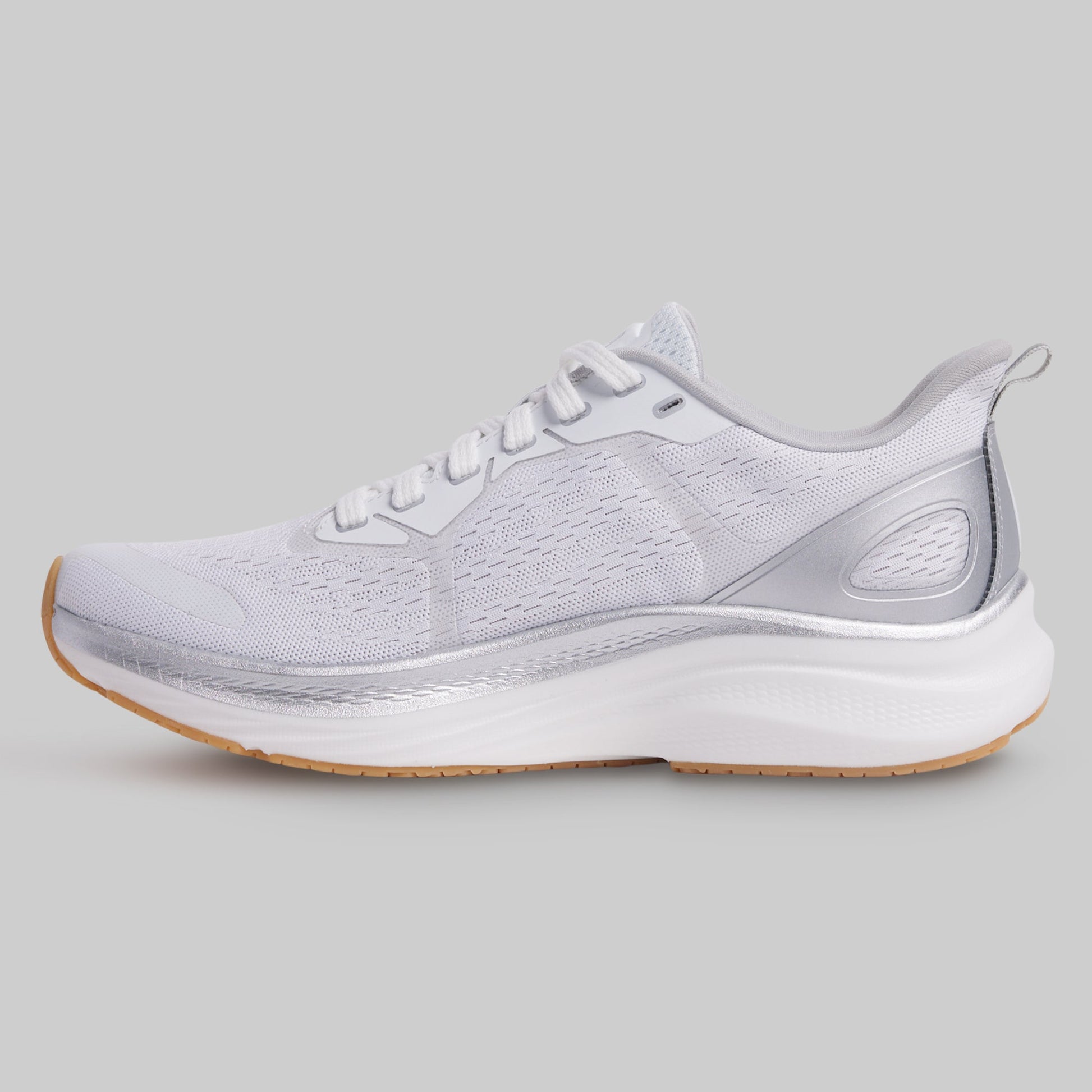 White running shoe on a gray background