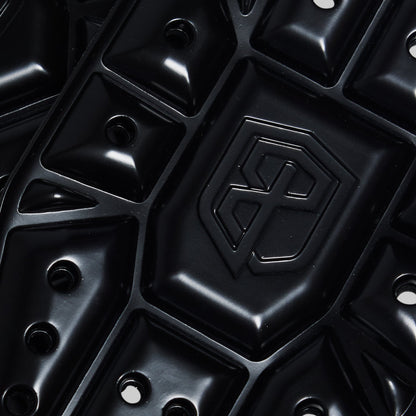 Close-up of a black knee pads with a brand logo.